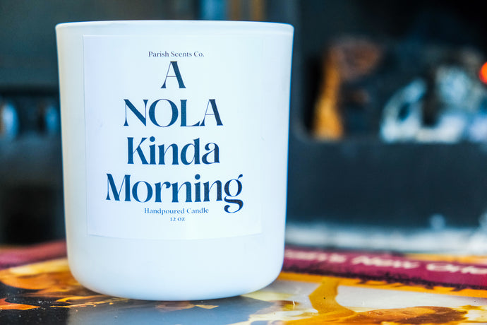 A NOLA Kinda Morning New Orleans Candle in a solid white 12 oz candle vessel